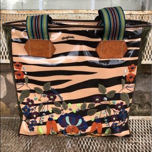 Consuela tote with internal pocket and leather accents.